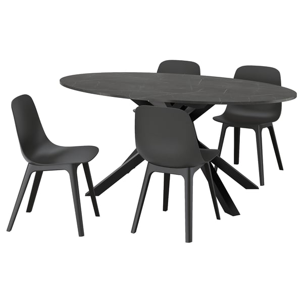 Black circular dining set with modern chairs, marble table, and sleek design