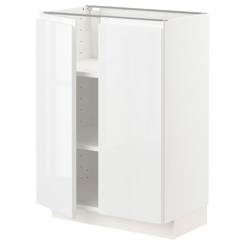 Displays a white METOD kitchen cabinet with a sleek, modern design. It high gloss, handle-less doors and adjustable shelving inside.
