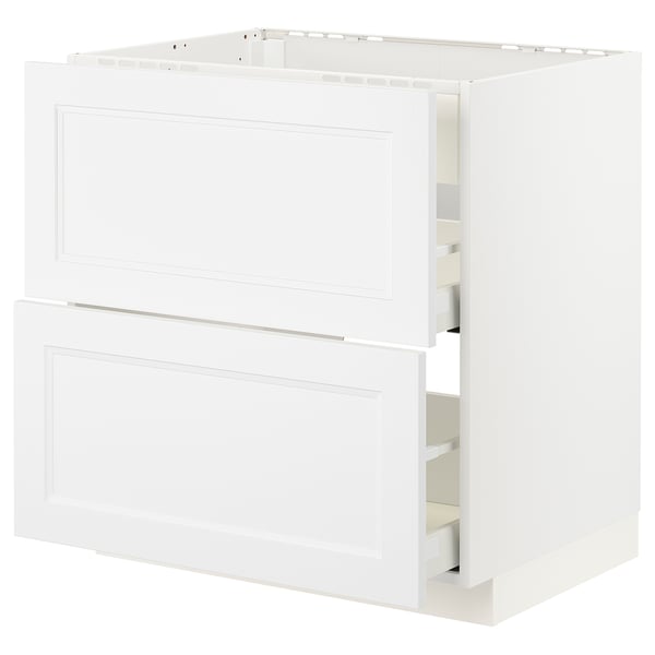 White METOD cabinet with open drawers, sleek, minimalist design.