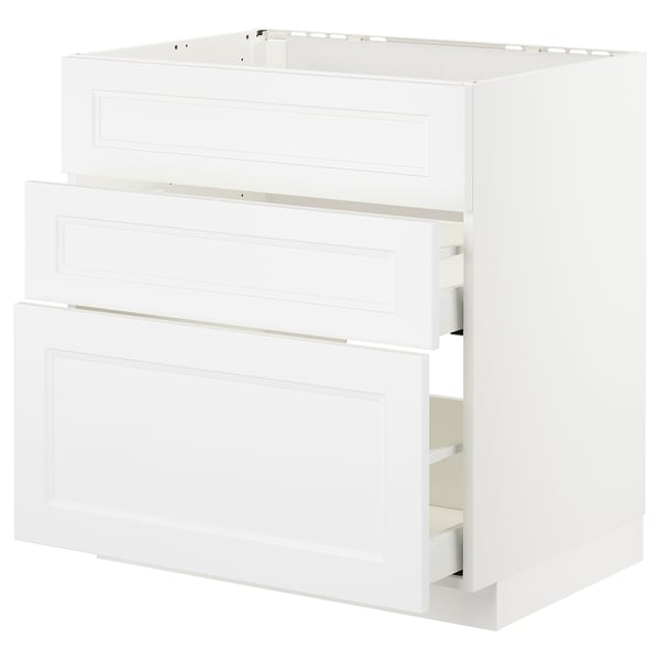 A white METOD kitchen cabinet with three drawers and a boxy design. The cabinet a smooth, clean look with a panel design on the drawer fronts.
