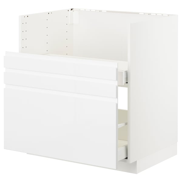 White METOD kitchen unit with high gloss finish and smooth drawers.