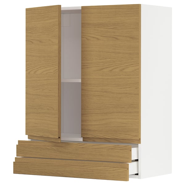 A modern, light-brown wooden kitchen cabinet set with white interiors and minimalist design.