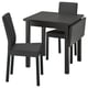 Modern dining set with black drop-leaf table and two upholstered chairs, ideal for small spaces.