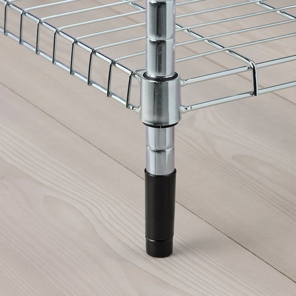 Metal shelving unit with adjustable feet on wooden floor.