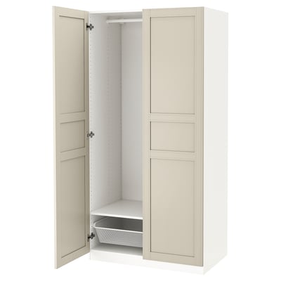 An open PAX wardrobe in white and beige with interior organisers.