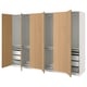 Wooden PAX wardrobe with drawers and shelves, four open doors.