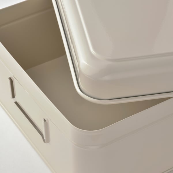Stacked white metal storage boxes. High-quality finish, smooth edges.