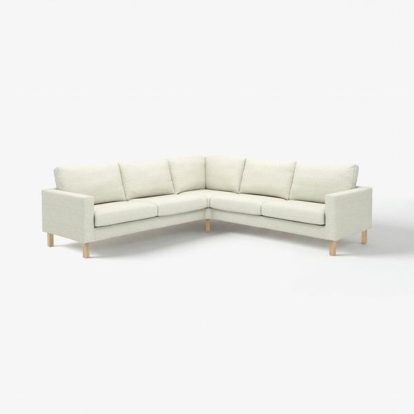 The SALTSJÖBADEN sectional is white, featuring clean lines and light wooden legs. Its modern u-shape offers comfort and functionality.
