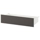 A SKATVAL drawer unit in white with a grey front panel. It has a rectangular shape with a sleek, minimalist design.