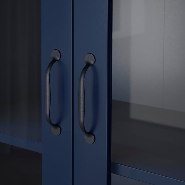 Dark blue cabinet with sleek, curved handles; sturdy, modern design.