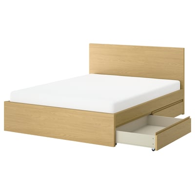 Light wood STORKLINTA bed with drawers, clean simple design.