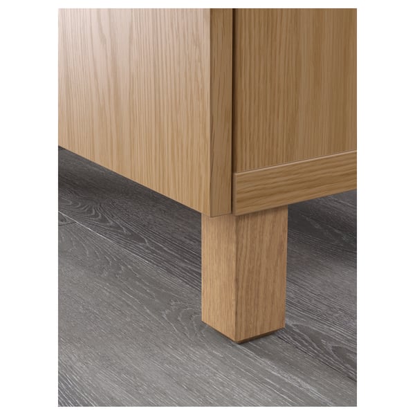 Wooden furniture detail, showing clean finish and sturdy leg.