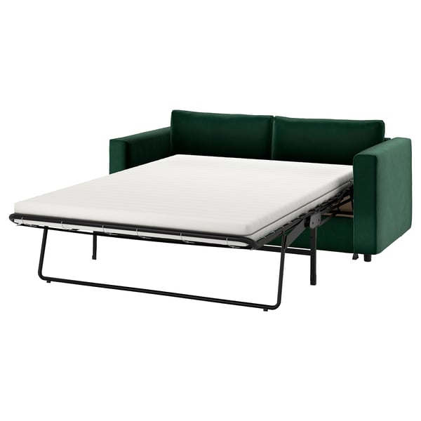Green VIMLE sofa-bed with metal frame, padded seat, and convertible mattress.