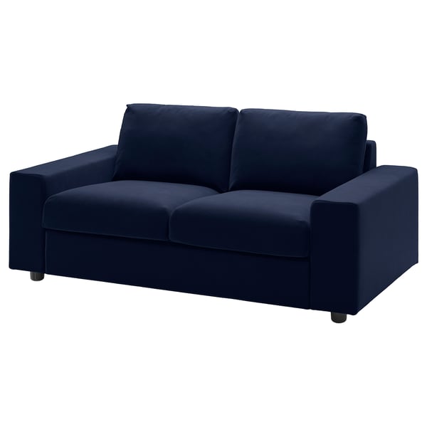 A VIMLE navy blue, 2-seater sofa with a velvet cover, rectangular shape, and wooden legs.