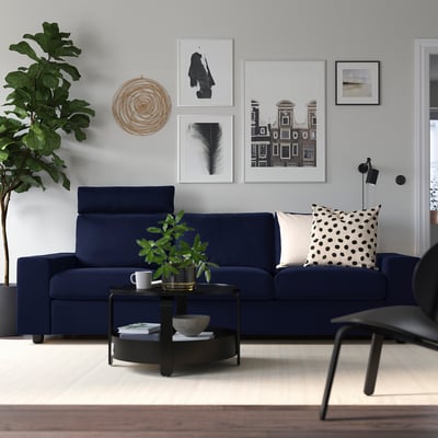 Blue VIMLE sofa, black & white decor, round coffee table, wall gallery - cosy & stylish.
