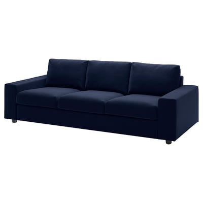 A blue VIMLE sofa. Its modern, with square cushions and a sleek design. The fabric is a mix of cotton, polyester, and viscose.
