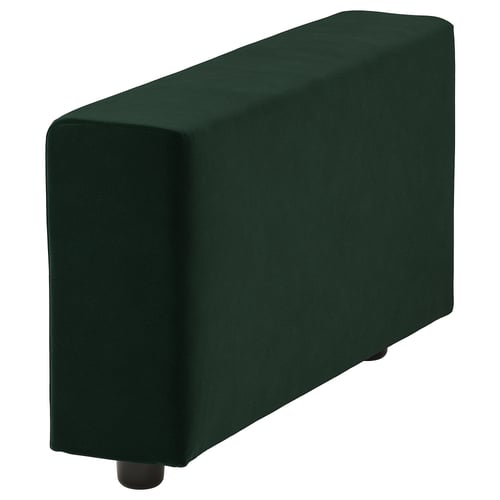 Dark green, rectangular ottoman with rounded corners and two small black legs. Modern, minimalist design.