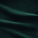 Dark velvet fabric close-up, smooth and plush texture, with subtle light reflections.