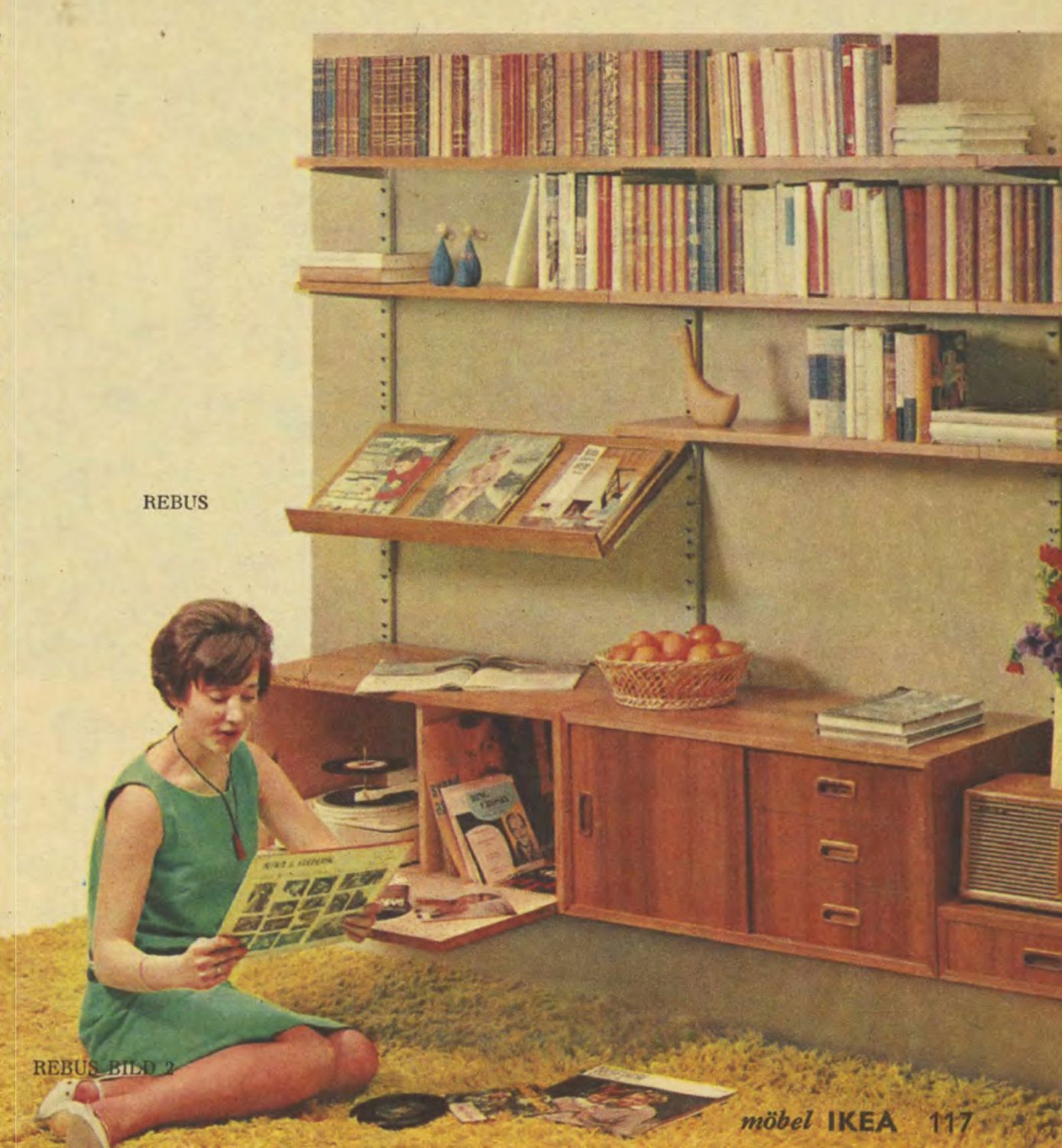 A 1965 catalogue image showing a person sitting on the floor, looking at her record collection.