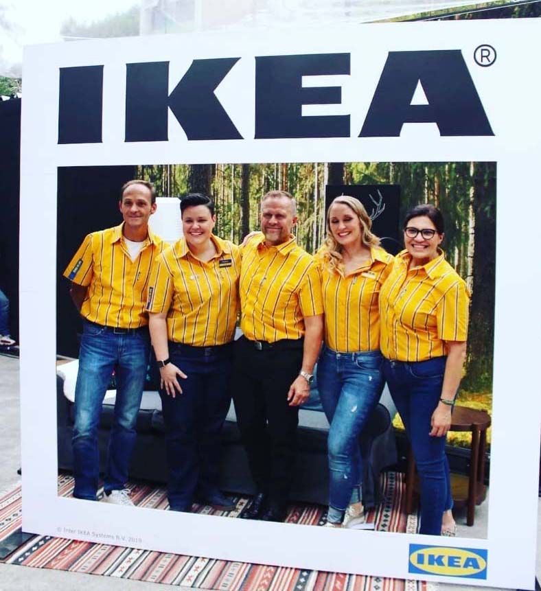 IKEA co-worker Antonia and her friends feature on a giant poster of the front of an IKEA catalogue.