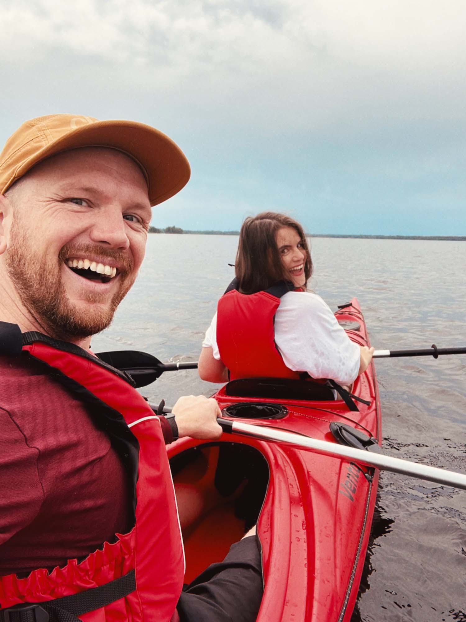 Sebastian and Alex kayaking on a lake in Älmhult.