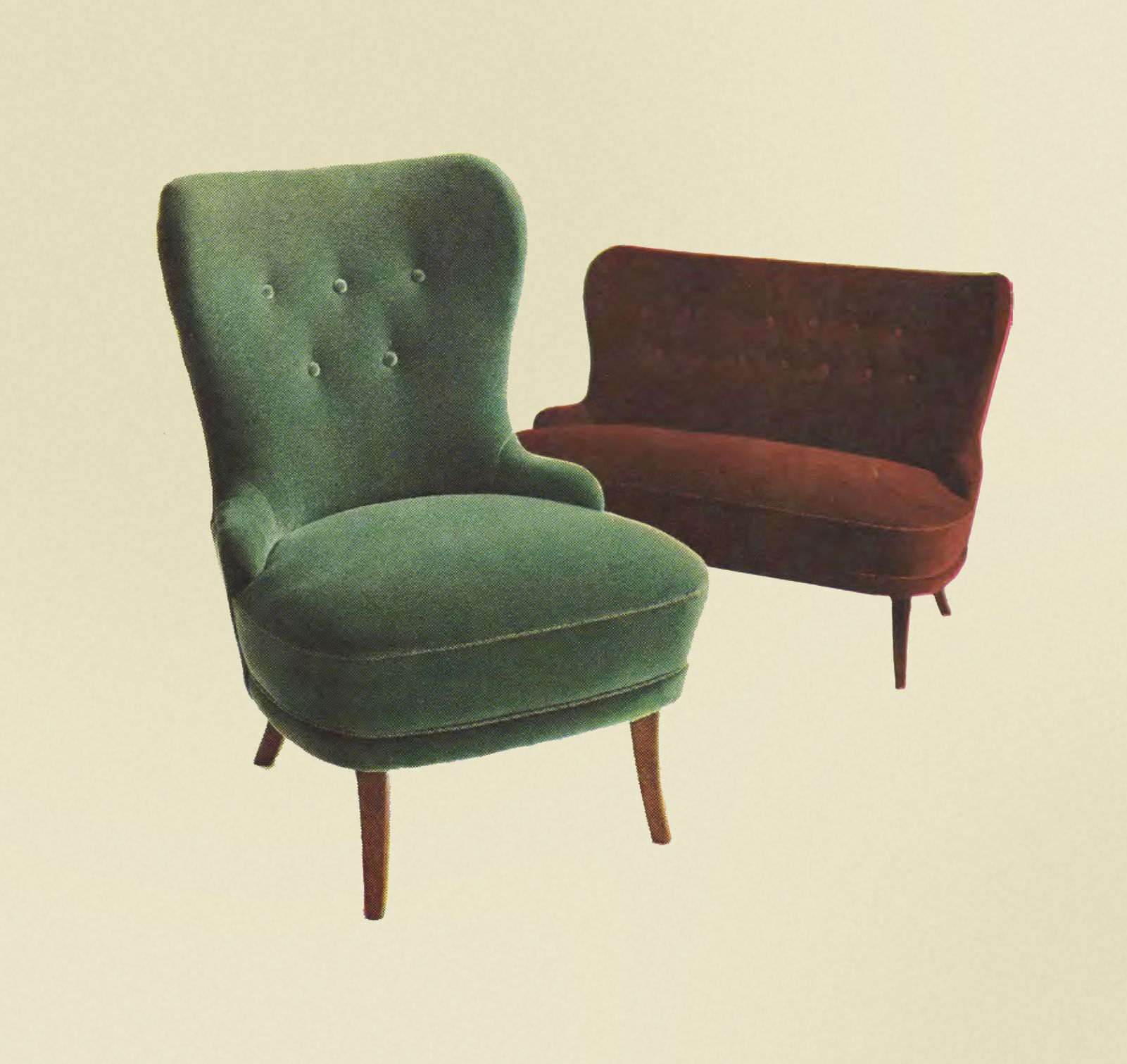 An antique style velvet chair in green and burgundy sofa. 