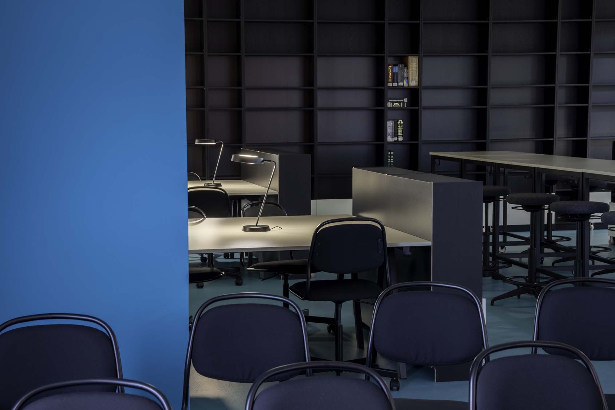 Chairs, tables and shelves in the library at the International Burch University.