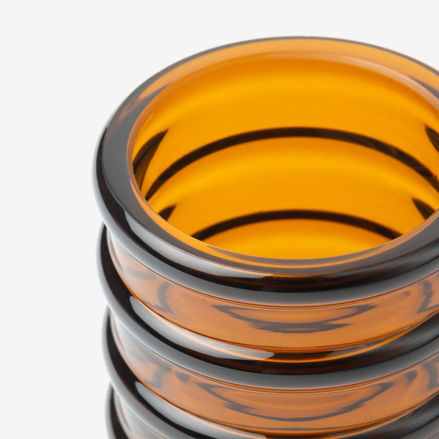 A close-up of a brown HÄNGBJÖRK vase on a grey background.