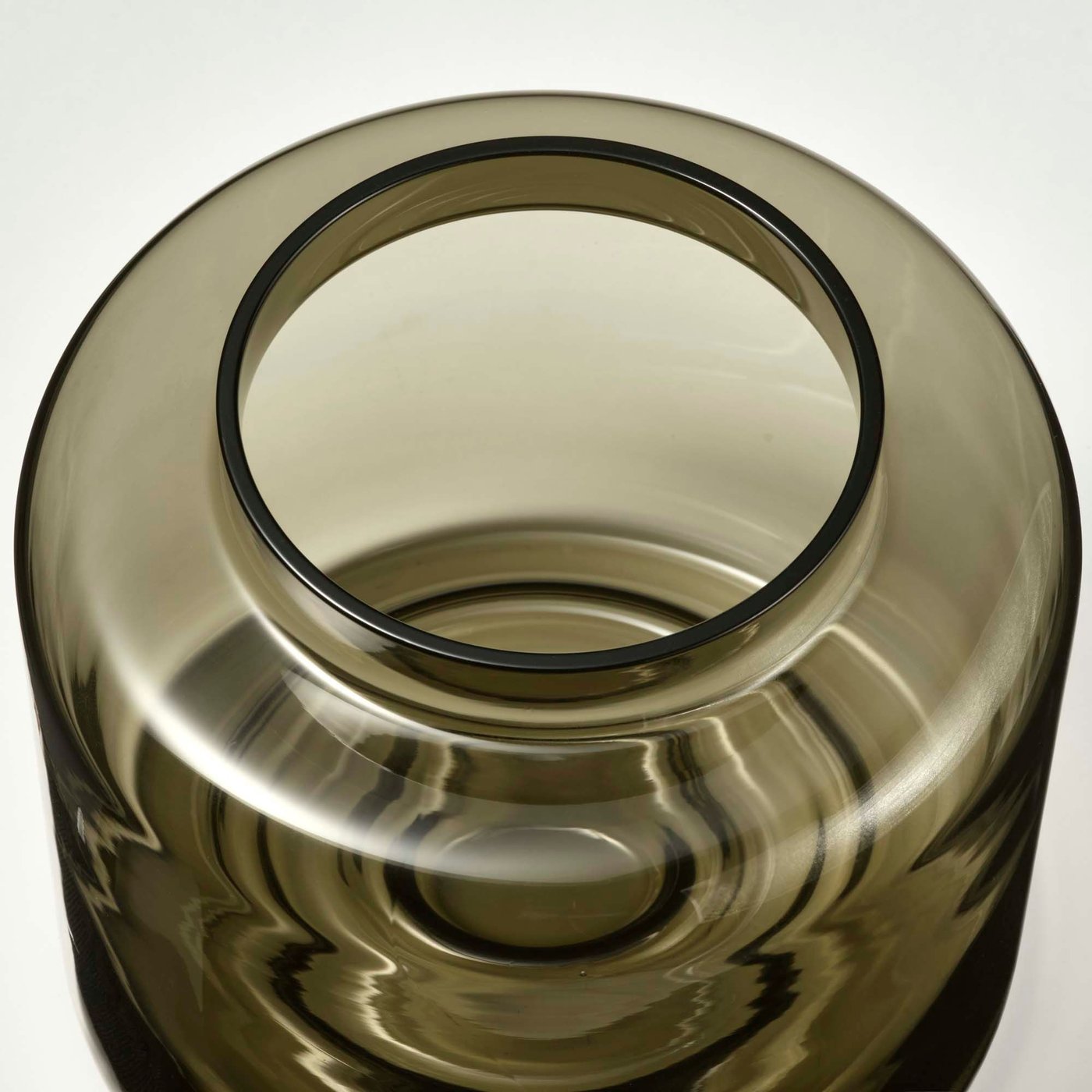 An aerial view of an empty brown glass KONSTFULL vase.