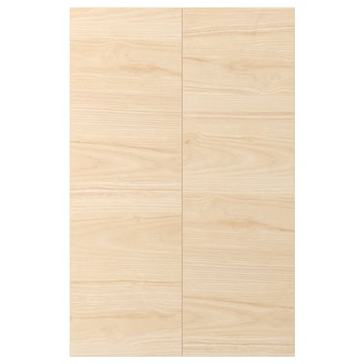 ASKERSUND cabinet doors with a light ash wood design and a blurred texture, made of melamine and particleboard.