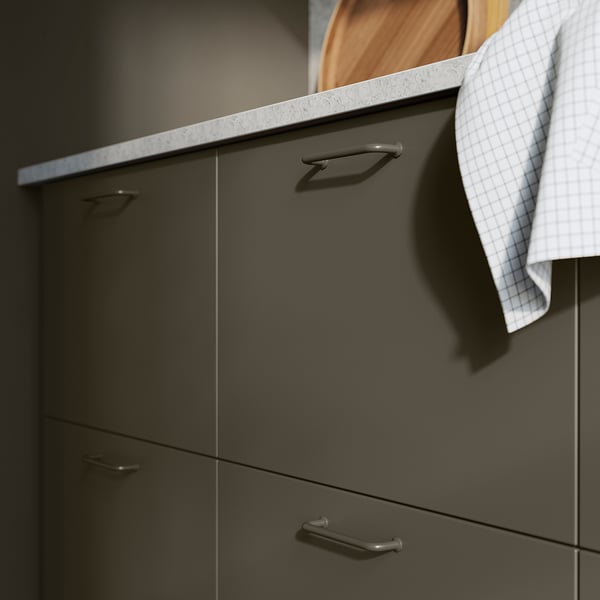 Dark grey kitchen cabinets with modern handles.