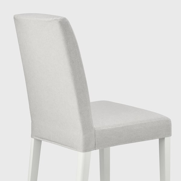 Modern grey fabric dining chair with wooden frame.