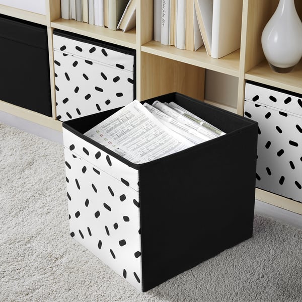DRÖNA: black&white box in fabric on shelf, stores papers, sized for kallax shelving.