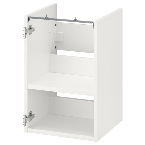 Depicts a white ENHET bathroom cabinet with one open door, revealing a shelf inside.