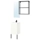Modern bathroom setup: white cabinet, black accents, mirror, and towel rack.