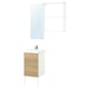 Modern bathroom setup featuring ENHET vanity with light wood cabinet, white counter, and sleek chrome faucet.