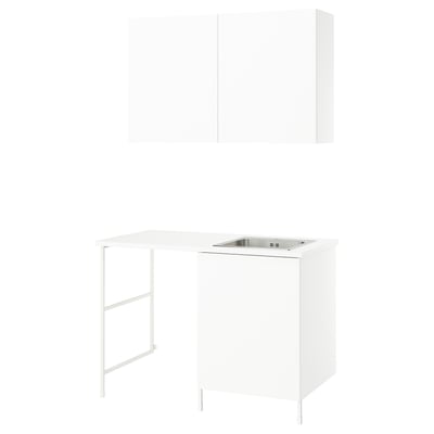 ENHET white laundry cabinet set with sink, stainless steel bowl, stainless steel feet, and wall cabinet.