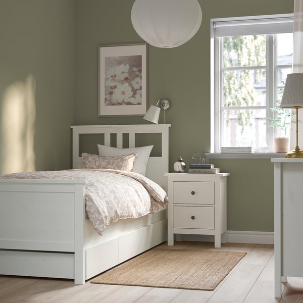 Cosy bedroom: white HEMNES bed, green walls, floral duvet. Bed smaller than window.