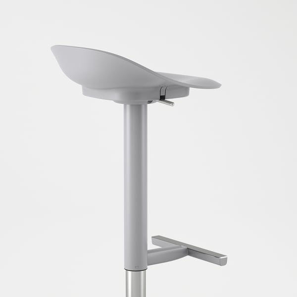 Stylish chair with scooped seat, sturdy metal base, and height-adjustable lever, showcasing quality and design.