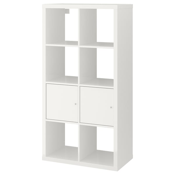 A white KALLAX shelves unit with two cabinets and open sections.