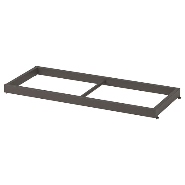A grey KOMPLEMENT clothes rail, rectangular in shape, designed to fit into wardrobes, with a sturdy metal frame.