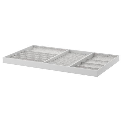 KOMPLEMENT jewelry organizer, white, felt-lined compartments for accessories, rectangular design.