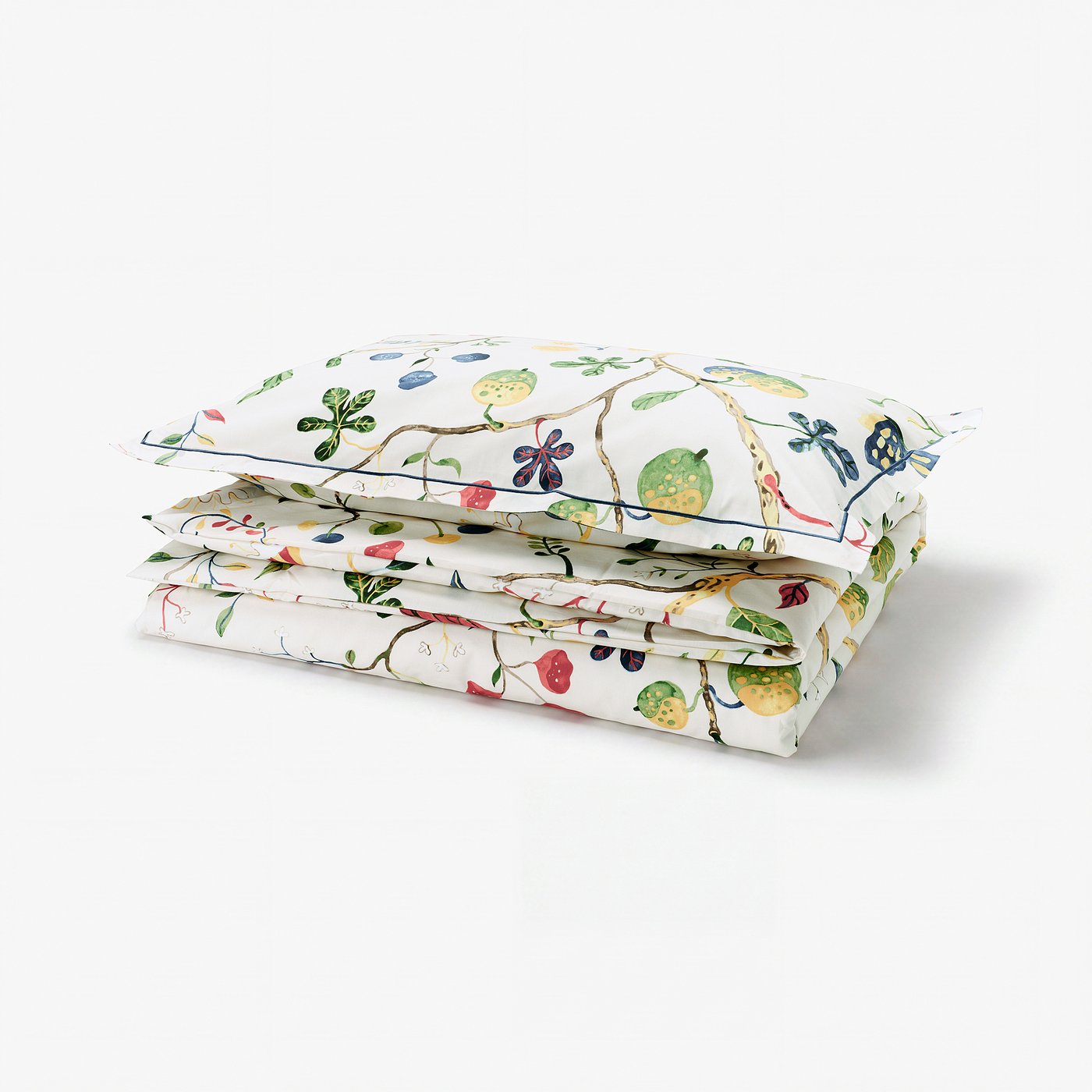 Folded white KRONBUSKE duvet set with colourful floral designs, crisp cotton-lyocell blend, embroidered pillow edges, 57% cotton, 43% lyocell.