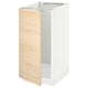 A white and light wood kitchen cabinet from the METOD system. It a modern design with a light ash wood pattern door and a sturdy frame for storage.