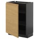 Dark grey framed kitchen cabinet with light wood door, partially open, revealing empty shelf.