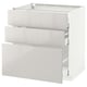 White high gloss METOD kitchen cabinet with three fully extendable drawers.