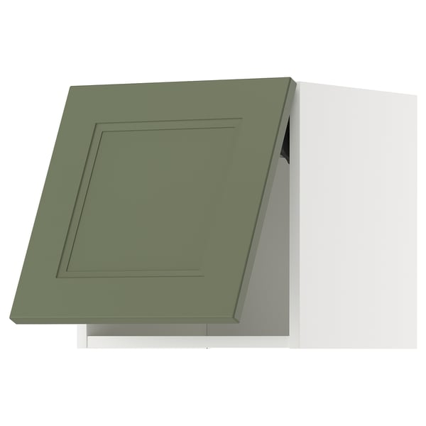 Green kitchen cabinet with square panel design.