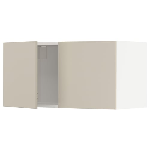 A beige METOD kitchen cabinet, featuring smooth, sleek doors with a modern design.