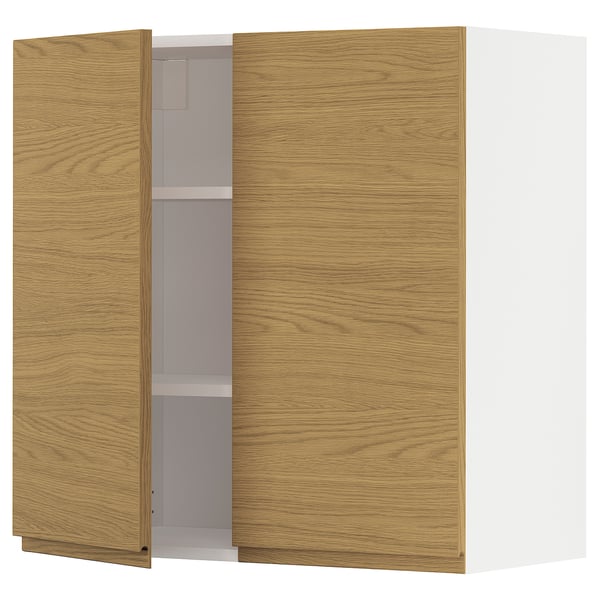 A METOD kitchen cabinet with oak-colored doors and minimalist design.