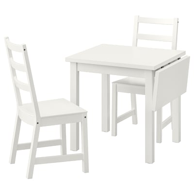 A NORDVIKEN dining set with a white square extendable table and matching chairs, designed for small spaces.